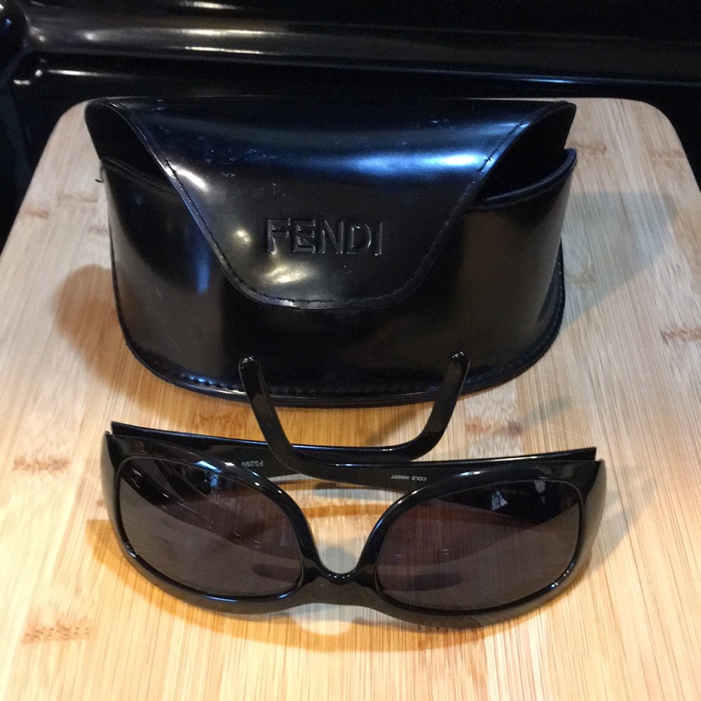 A pair of Women’s FENDI Black Sunglasses